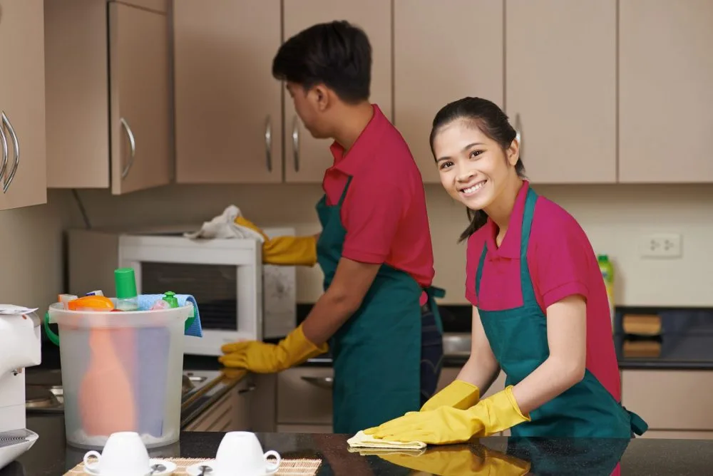 CleanologySG cleaners deep cleaning a Singapore home